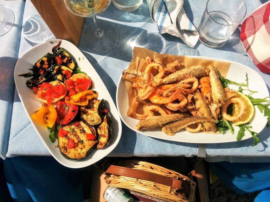 Enjoying food in the seaside village of Ostuni. Photo credit: Sharon Vassallo